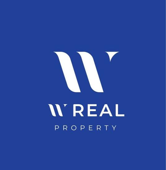 W Real Property