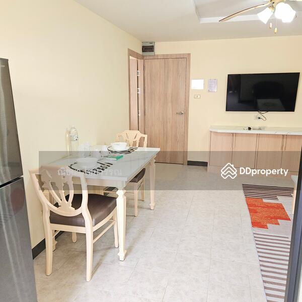 Dinning area with large TV.