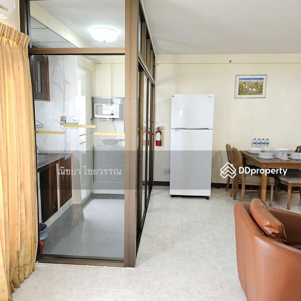Omni Suites Aparts-Hotel, Bangkok, 25 Soi Srinakarin 9, Suan Luang, Bangkok, 2 Bedrooms, 86 sqm, Apartment For Rent, by ณิชยา ไชยวรรณ, 11228394 - Separated kitchen with glass sliding door . Large refrigerator with freezer on top. - DDproperty.com