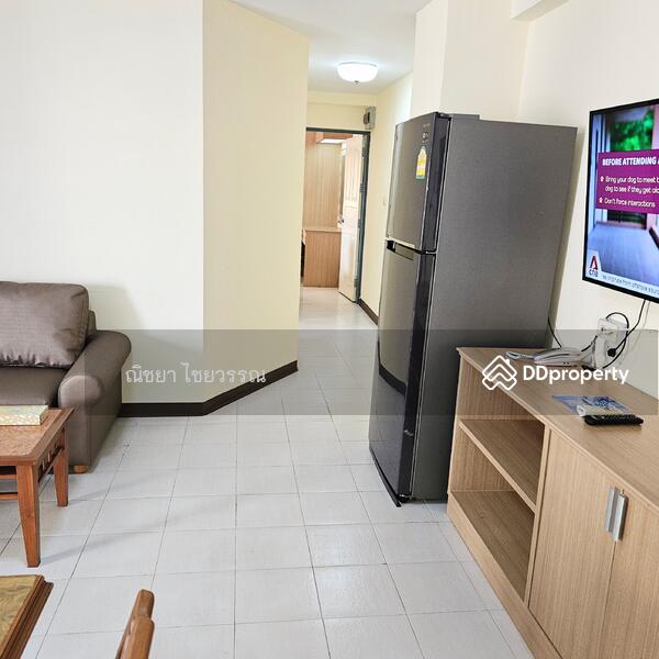 Walk way from living room to bedrooms.