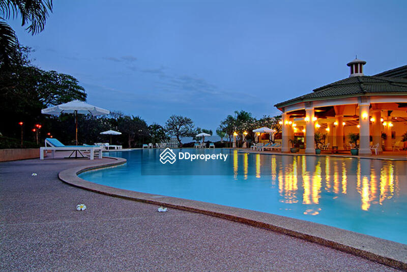 Sports Club illuminated at night
