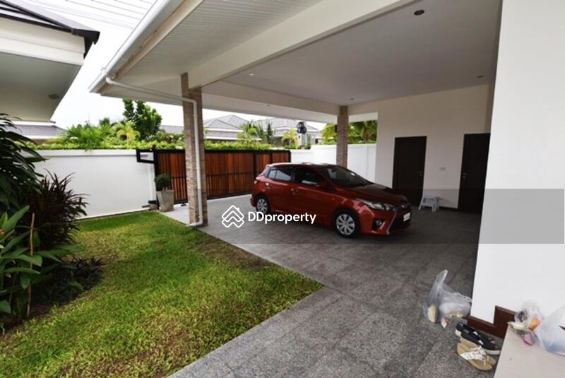 Double covered carpark with utility rooms