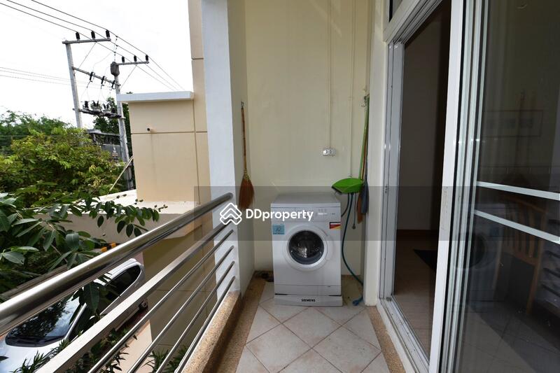 Washing mashine at kitchen balcony