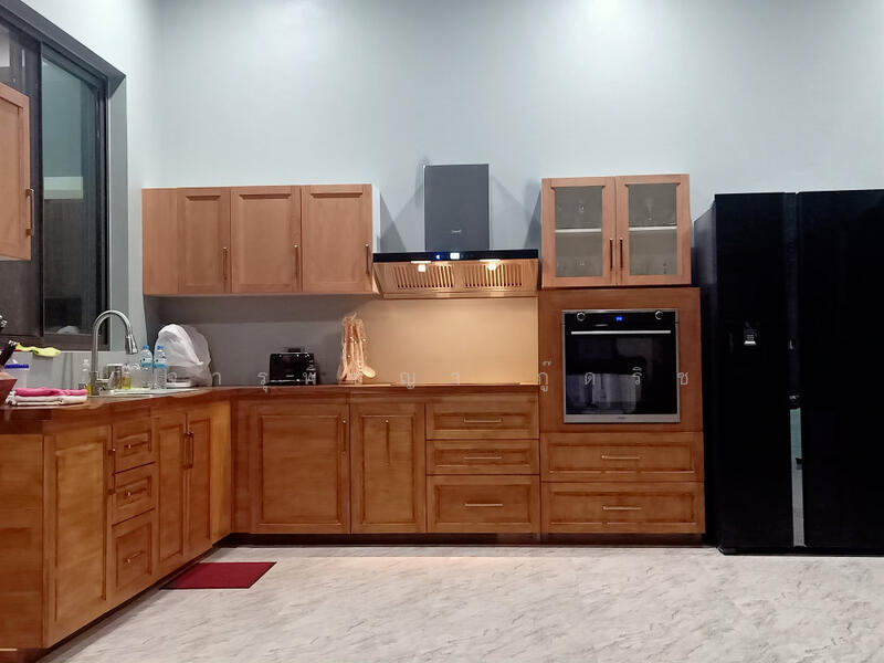 Inside custom kitchen with teak counter