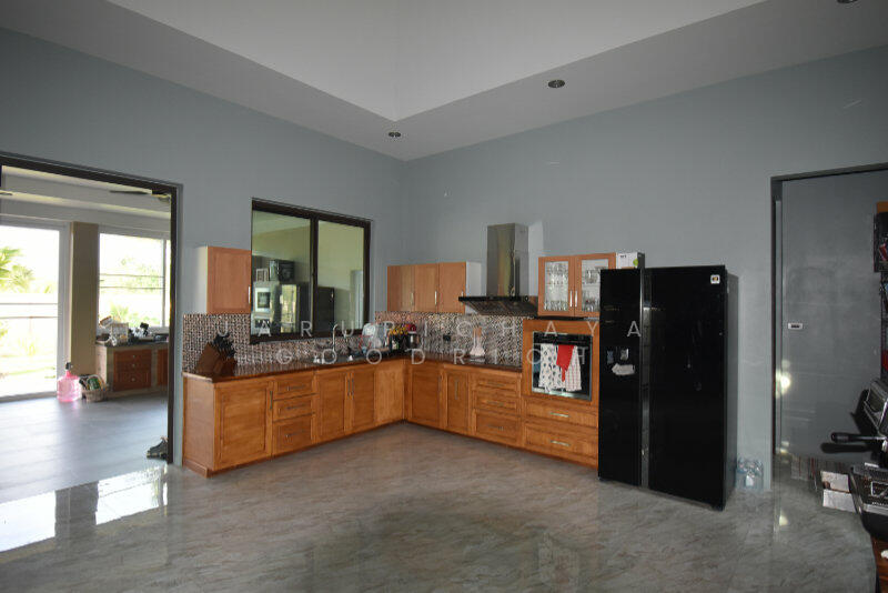 Inside custom kitchen with teak counter