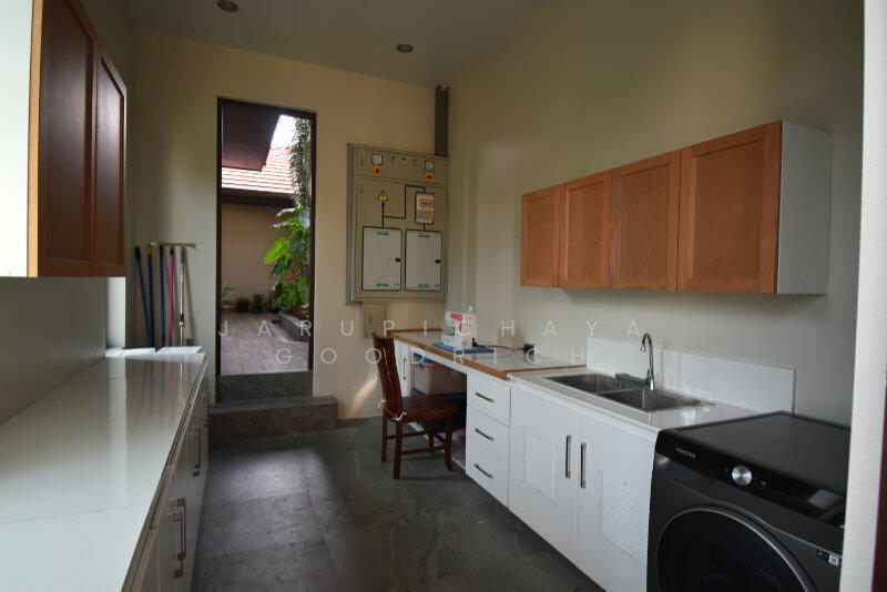 Laundry room with front porch entrance