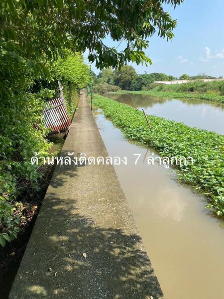 For Sale - The land is located next to a 4-lane road, Route 3004 (Khlong 7), Lam Luk Ka, and Rangsit-Nakhon, Pathum Thani