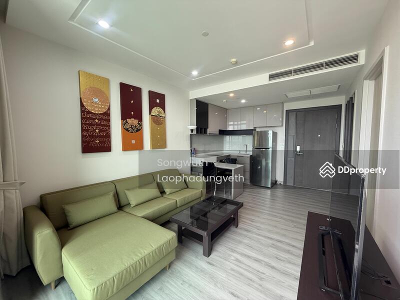 A renovated spacious living room . Fully finished , TV, refrigerator, Washing machine .Ready to move