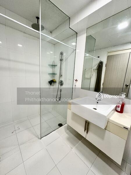 bathroom with rain shower