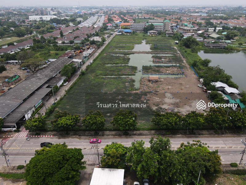 ขายที่ดินแปลงใหญ่—ติดถนนเฉลิมพระเกียรติ ร.9 กว้าง 4 เลน (เหมาะสร้าง โครงการจัดสรร) 15-3-40.5 ไร่