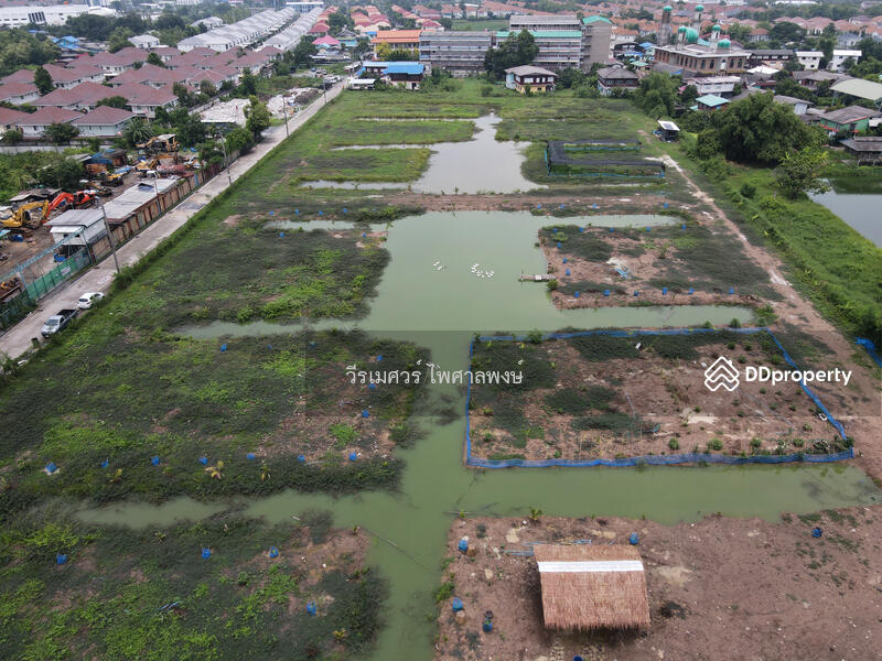 ขายที่ดินแปลงใหญ่—ติดถนนเฉลิมพระเกียรติ ร.9 กว้าง 4 เลน (เหมาะสร้าง โครงการจัดสรร) 15-3-40.5 ไร่