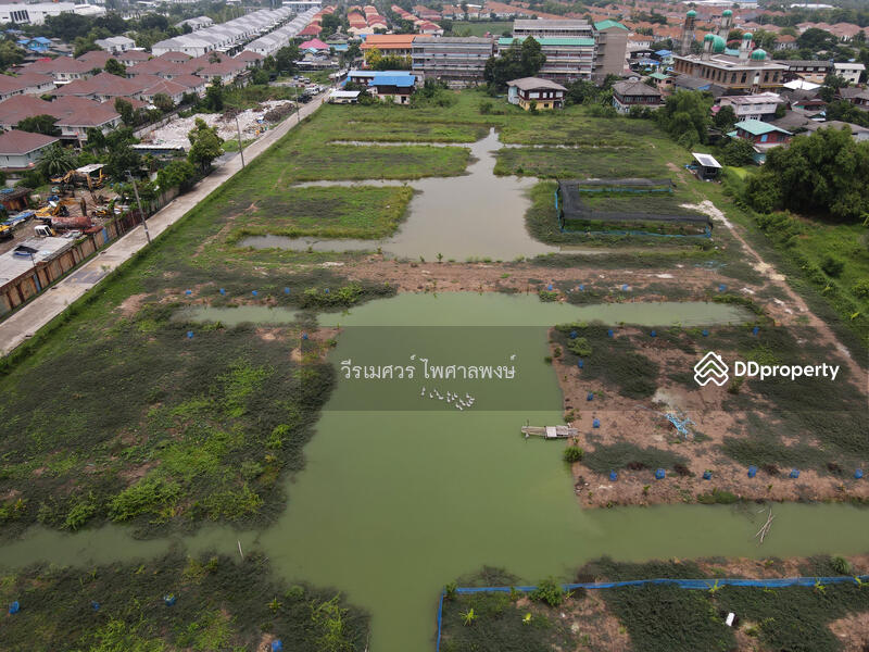 ขายที่ดินแปลงใหญ่—ติดถนนเฉลิมพระเกียรติ ร.9 กว้าง 4 เลน (เหมาะสร้าง โครงการจัดสรร) 15-3-40.5 ไร่