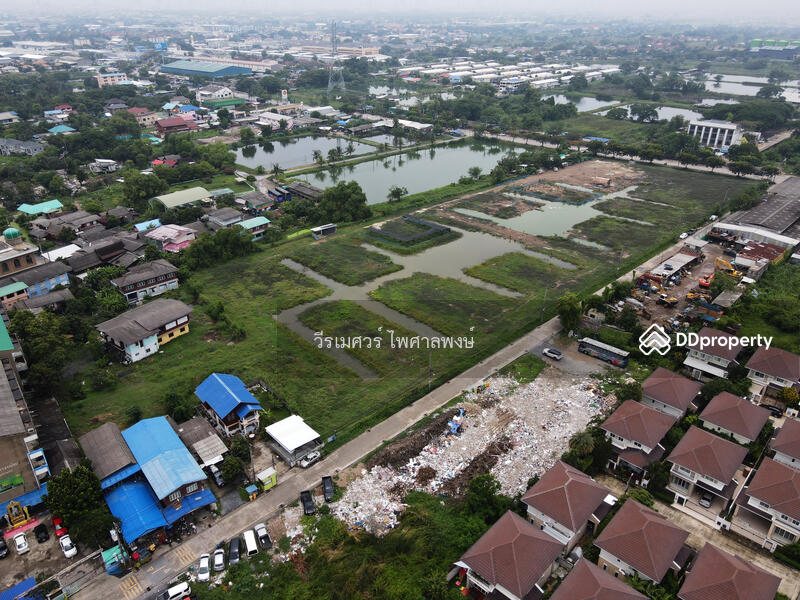 ขายที่ดินแปลงใหญ่—ติดถนนเฉลิมพระเกียรติ ร.9 กว้าง 4 เลน (เหมาะสร้าง โครงการจัดสรร) 15-3-40.5 ไร่