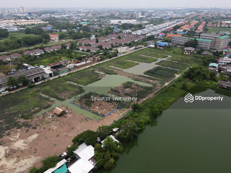 ขายที่ดินแปลงใหญ่—ติดถนนเฉลิมพระเกียรติ ร.9 กว้าง 4 เลน (เหมาะสร้าง โครงการจัดสรร) 15-3-40.5 ไร่
