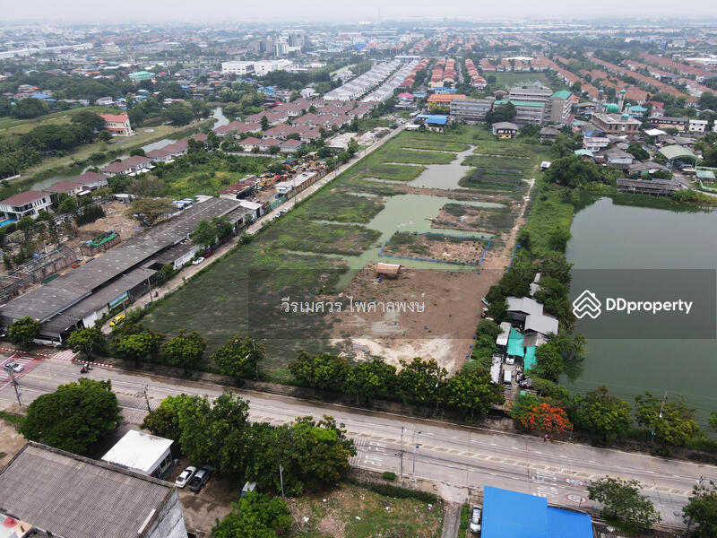 ขายที่ดินแปลงใหญ่—ติดถนนเฉลิมพระเกียรติ ร.9 กว้าง 4 เลน (เหมาะสร้าง โครงการจัดสรร) 15-3-40.5 ไร่