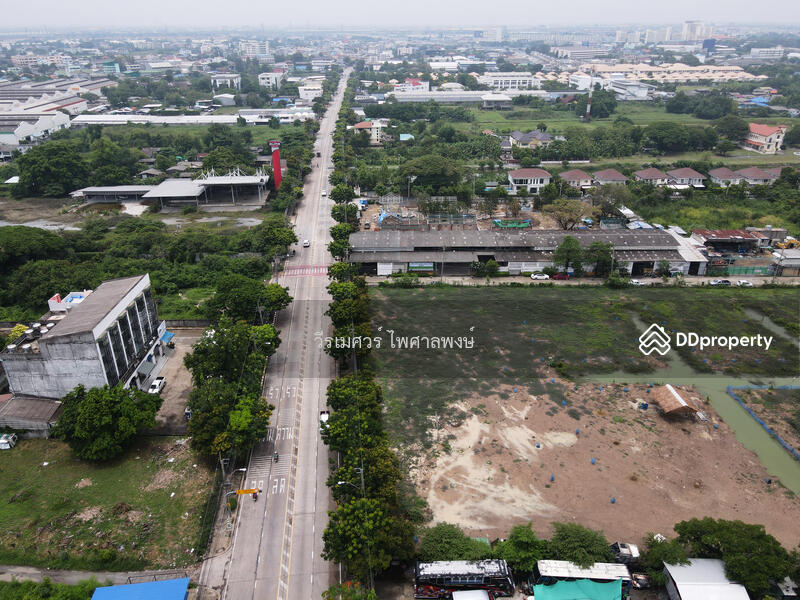 ขายที่ดินแปลงใหญ่—ติดถนนเฉลิมพระเกียรติ ร.9 กว้าง 4 เลน (เหมาะสร้าง โครงการจัดสรร) 15-3-40.5 ไร่